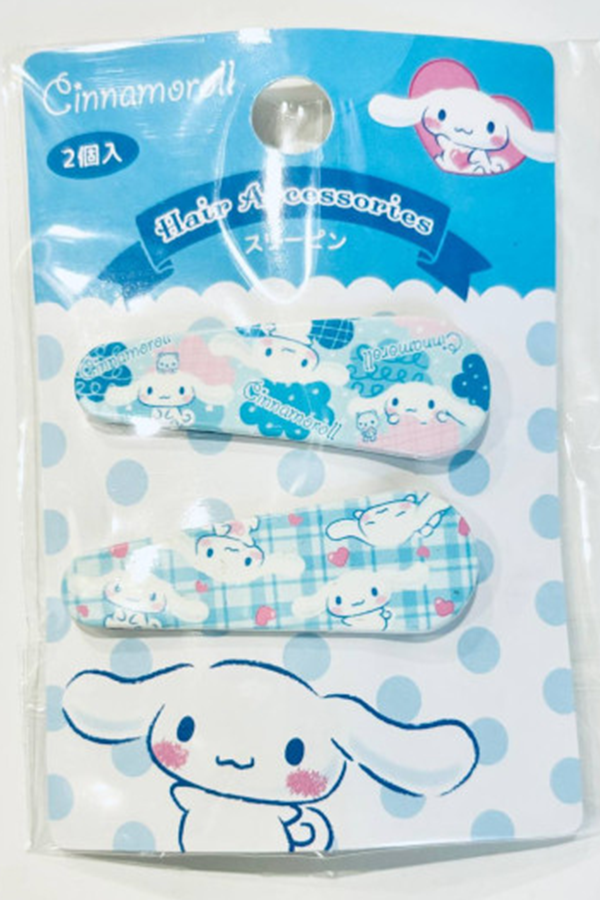 Sett med to Cinnamoroll hårspenner fra Sanrio.