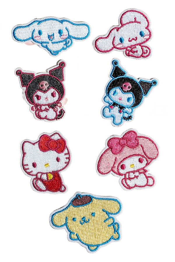 Et utvalg av Sanrio stryke-merker som viser Kuromi, Cinnamoroll og Hello Kitty.