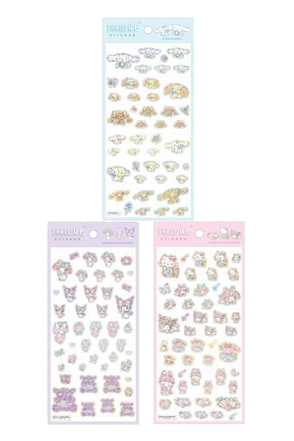 3 ark med Sanrio "Three UP" glitter-klistremerker for lag-på-lag dekorering.
